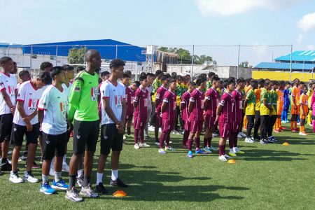 The March Past featuring all the competing teams in the KFC Goodwill Schools Football Series from left to right: SVB Academy of Suriname, DC Caesar Fox [formerly Waramadong], St. Benedict College of Trinidad and Tobago, Christianburg/Wismar, Annai Secondary, and Golden Grove