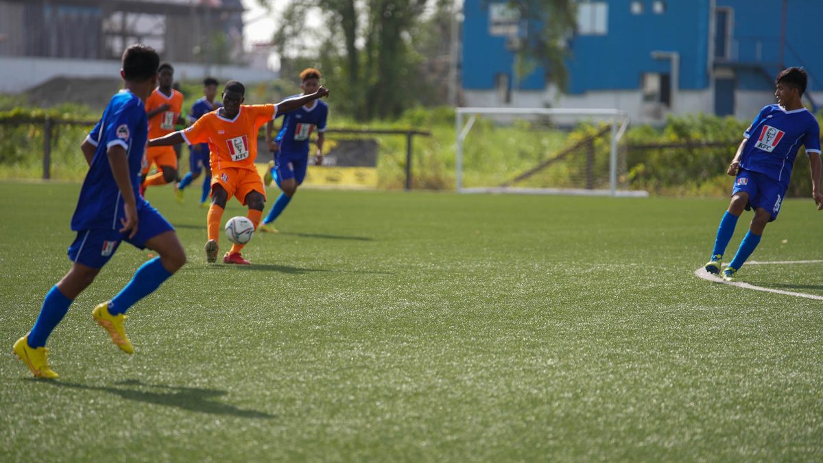 Flashback – A scene from the opening match between defending champion Annai (blue) and Christianburg/Wismar in the KFC Goodwill Schools Football Series at the National Training Centre, Providence