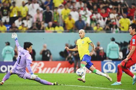 Richarlison (centre) scores the third goal as Brazil crush South Korea to book their place in the quarterfinal round of the 2022 FIFA World Cup
