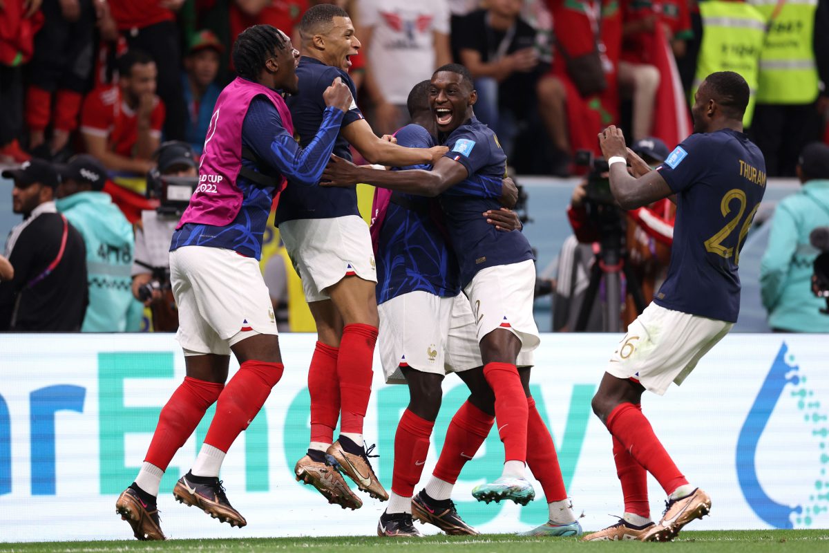 Unbridled Joy! Substitute forward Randal Kolo Muani (3rd from right) celebrating with teammates after scoring with his first touch to seal defending champion France’s place in the 2022 FIFA World Cup final