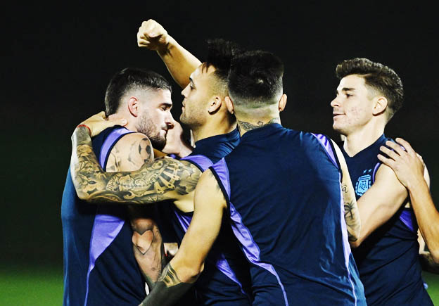 Argentina's Rodrigo De Paul, Lautaro Martinez, Julian Alvarez
and teammates during training REUTERS/Dylan Martinez