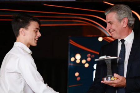 Zane Maloney accepts his award from CEO of Dallara Automobili, Andrea Pontremoli.
