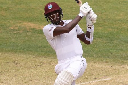 Alzarri Joseph, left, and Roston Chase featured in a precious 82-run stand for the eighth wicket.
