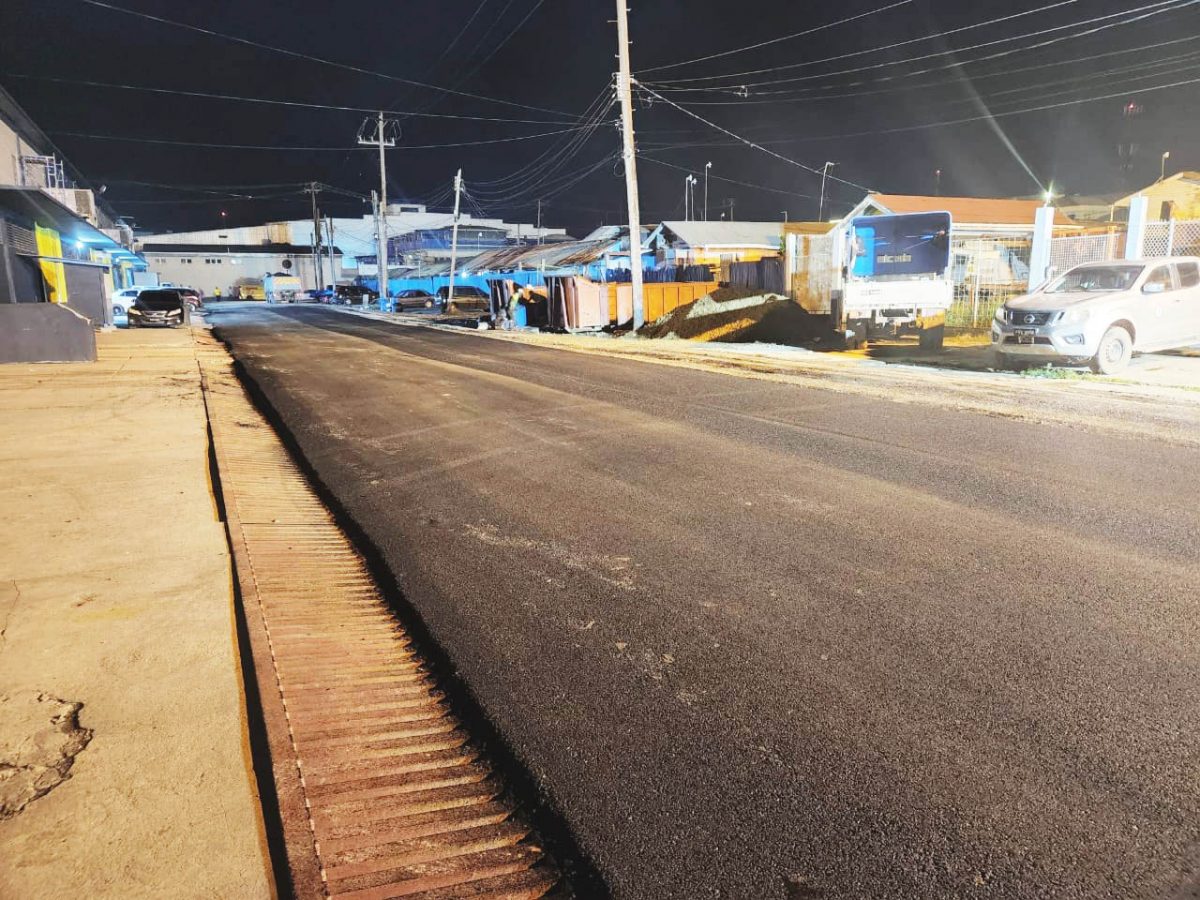 The Ministry of Works’ Special Projects Unit on Wednesday evening completed paving of Commerce Street in the vicinity of John Fernandes Ltd. (Ministry of Public Works photo)