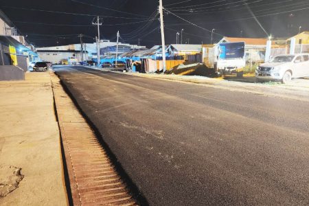 The Ministry of Works’ Special Projects Unit on Wednesday evening completed paving of Commerce Street in the vicinity of John Fernandes Ltd. (Ministry of Public Works photo)