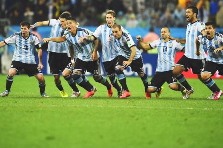 The Argentina players celebrate their penalty shootout win over the Netherlands.