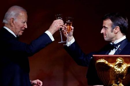 U.S. President Joe Biden and France's President Emmanuel Macron raise their glasses to toast, as the Bidens host the Macrons for a State Dinner at the White House, in Washington, U.S., December 1, 2022. (Reuters)
