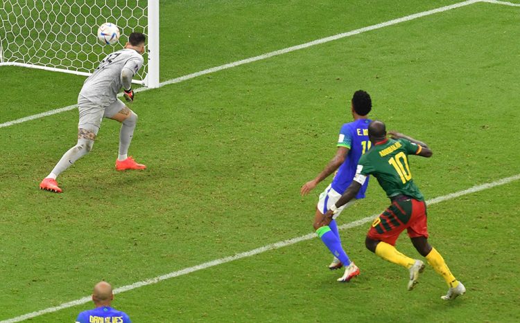 Cameroon’s Vincent Aboubakar scores their first goal REUTERS/Jennifer Lorenzini
