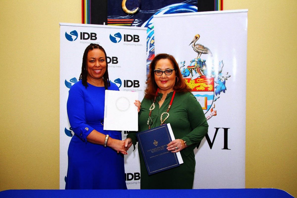 Carina Cockburn (left), IDB country representative for Trinidad and Tobago and Pro Vice-Chancellor and Campus Principal Professor Rose-Marie Belle Antoine at the signing. 