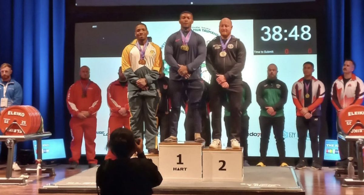 Yesterday, Carlos Petterson-Grifith put his ‘raw’ strength on display and ‘chalked up’ yet another top of the podium, record breaking performance at the ongoing Commonwealth Powerlifting Championships in Auckland, New Zealand.