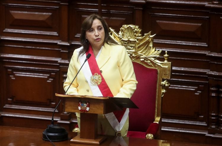 Peru's Vice President Dina Boluarte, who was called on by Congress to take the office of president after the legislature approved the removal of President Pedro Castillo in an impeachment trial, attends her swearing-in ceremony in Lima, Peru December 7, 2022. REUTERS/Sebastian Castaneda