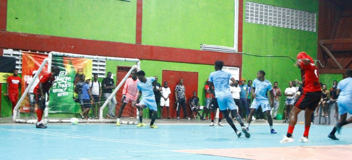 A scene from the men’s final between Bent Street (red) and Future Stars in the MVP Sports Futsal Championships.