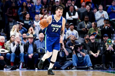Dallas Mavericks guard Luka Doncic (77) posted the first 60-point triple double in NBA history Tuesday night  against the New York Knicks at American Airlines Center. Mandatory Credit: Kevin Jairaj-USA TODAY Sports