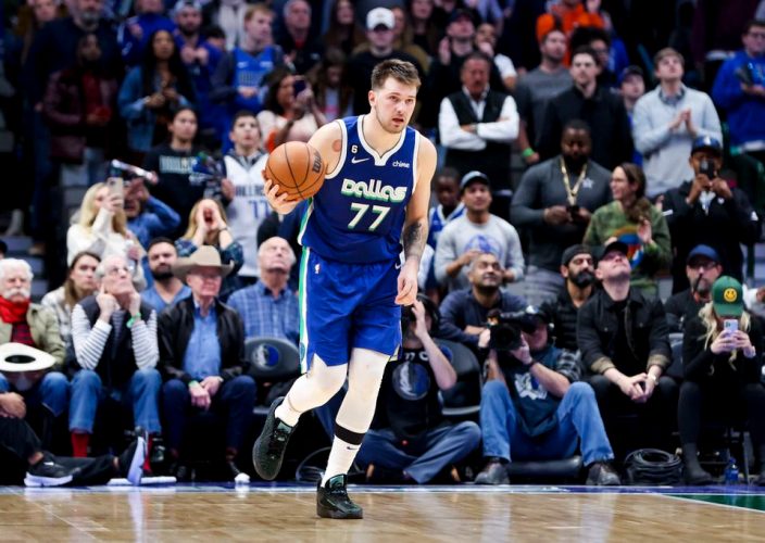 Dallas Mavericks guard Luka Doncic (77) posted the first 60-point triple double in NBA history Tuesday night  against the New York Knicks at American Airlines Center. Mandatory Credit: Kevin Jairaj-USA TODAY Sports