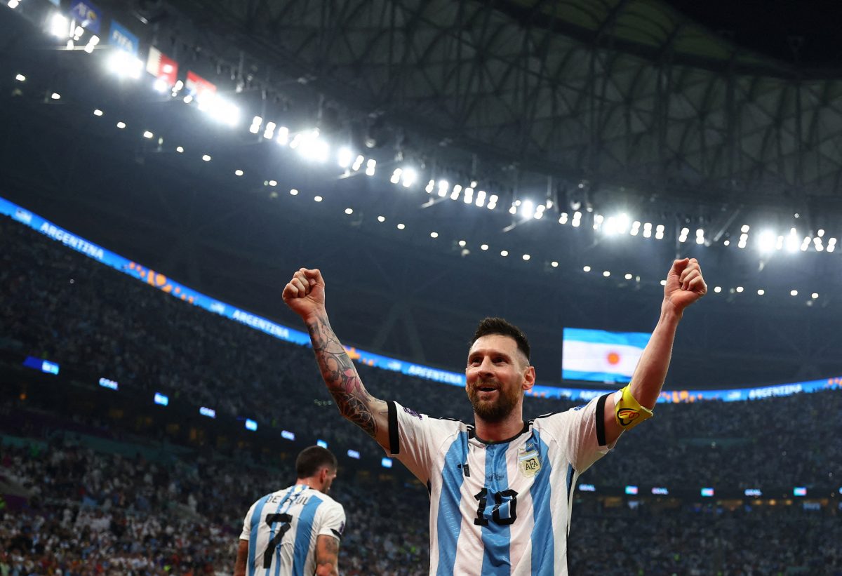 Argentina's Lionel Messi celebrates their third goal scored by Julian Alvarez REUTERS/Molly Darlington