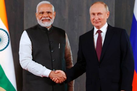Russian President Vladimir Putin, right, and Indian Prime Minister Narendra Modi pose for a photo shaking hands prior to their talks on the sidelines of the Shanghai Cooperation Organisation (SCO) summit in Samarkand, Uzbekistan, Friday, Sept. 16, 2022. AP/PTI