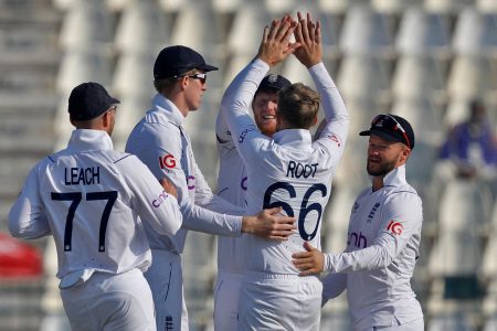 England’s Joe Root celebrates with his teammates after the dismissal of Pakistan’s Faheem Ashraf. REUTERS/Akhtar Soomro