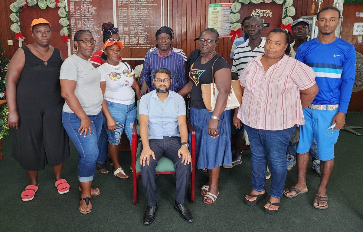 Mayor Narine (seated) with the vendors he met yesterday 