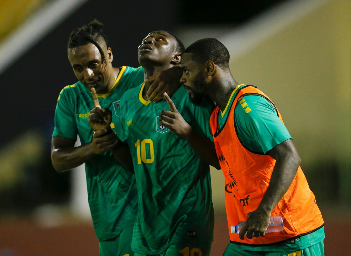 Omari Glasgow (centre) was the star in Guyana’s opening CNL encounter. 