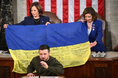 Ukraine’s President Volodymyr Zelensky speaks after giving a Ukrainian national flag to United States (US) House Speaker Nancy Pelosi and US Vice President Kamala Harris during his address the US Congress at the US Capitol on Dec 21, 2022.
