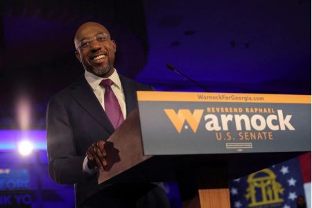 U.S. Senator Raphael Warnock (D-GA) speaks during an election night party after a projected win in the U.S. midterm runoff election between Warnock and his Republican challenger Herschel Walker in Atlanta, Georgia, U.S., December 6, 2022. REUTERS/Carlos Barria