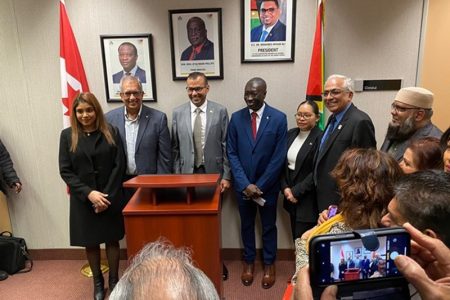 Guyana’s High Commissioner to Canada, Keith George (fourth from left) and Foreign Secretary Robert Persaud (third from left) at the event. (DPI photo)