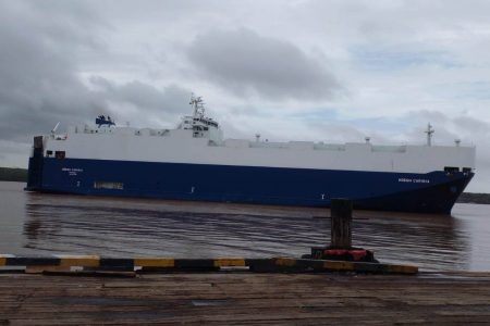 The car carrier, Hoegh Caribia berthing alongside GNSCL’s wharf this week to discharge 466 automobiles. (GNSCL photo) 