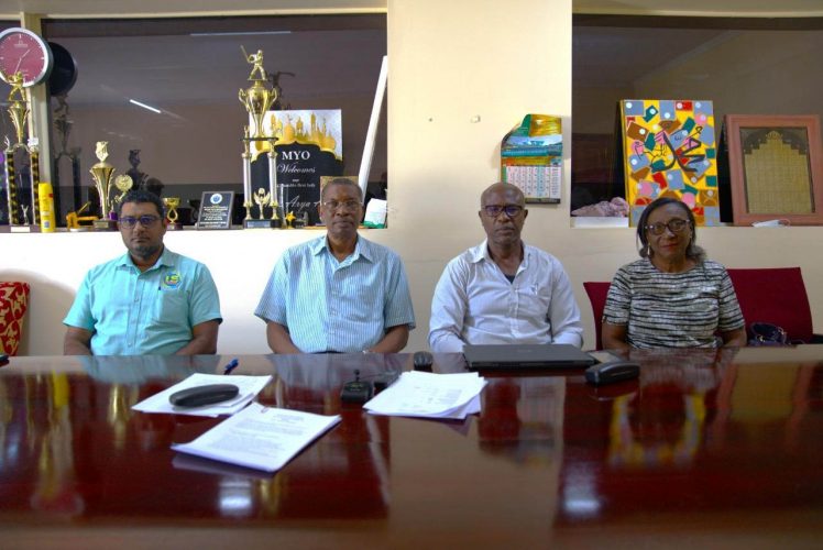 From left, Georgetown Cricket Association executives Brother Imran Ali (Treasurer),
Roger Harper (Vice-President), Neil Barry snr (President) and Debroah McNichol (Secretary)
