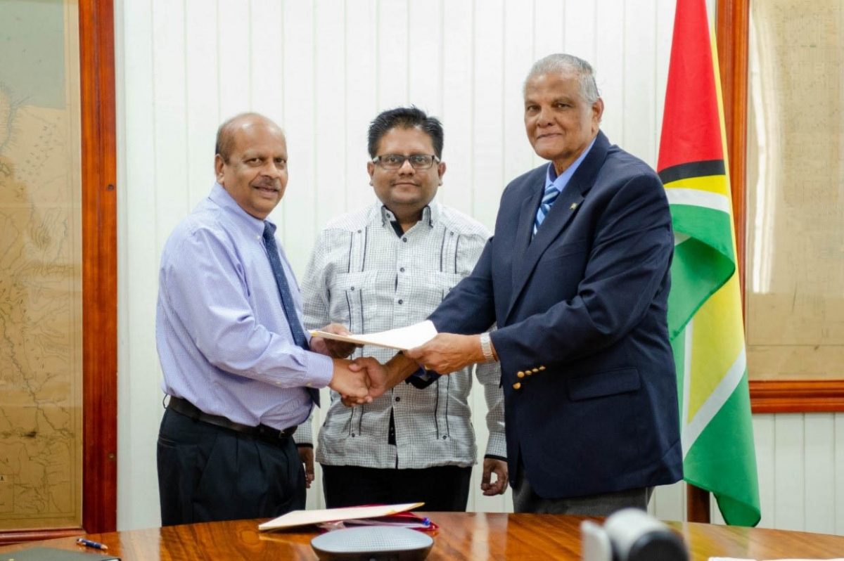 From left are Governor of the Bank of Guyana, Gobind Ganga; Minister of Finance Dr Ashni Singh; Major General (Rtd) Joe Singh.