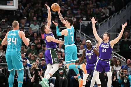 Charlotte Hornets guard LaMelo Ball (1) looks for someone to pass to against Milwaukee Bucks guard
Grayson Allen (12) in the first half at Fiserv Forum. Mandatory Credit: Michael McLoone-USA TODAY Sports