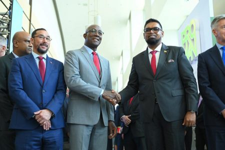 From right are President Irfaan Ali, Trinidadian Prime Minister Keith Rowley and Trinidad’s  Minister of Energy and Energy Industries, Stuart Young at yesterday energy conference in Trinidad. (Office of the President photo)