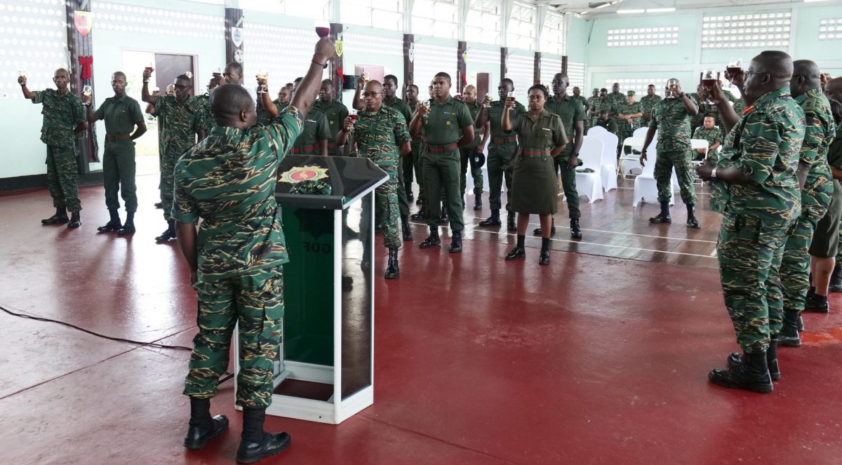 Chief of Staff (ag) of the Guyana Defence Force, Brigadier Godfrey Bess yesterday decorated 31 newly promoted Warrant Officers and Senior Non-Commissioned Officers with their new badges of rank, during a ceremony at the auditorium, Base Camp Ayanganna. 
This batch is among the more than 700 Other Ranks whose promotions took effect from January 1, 2023. This GDF photo shows a toast at the ceremony.
