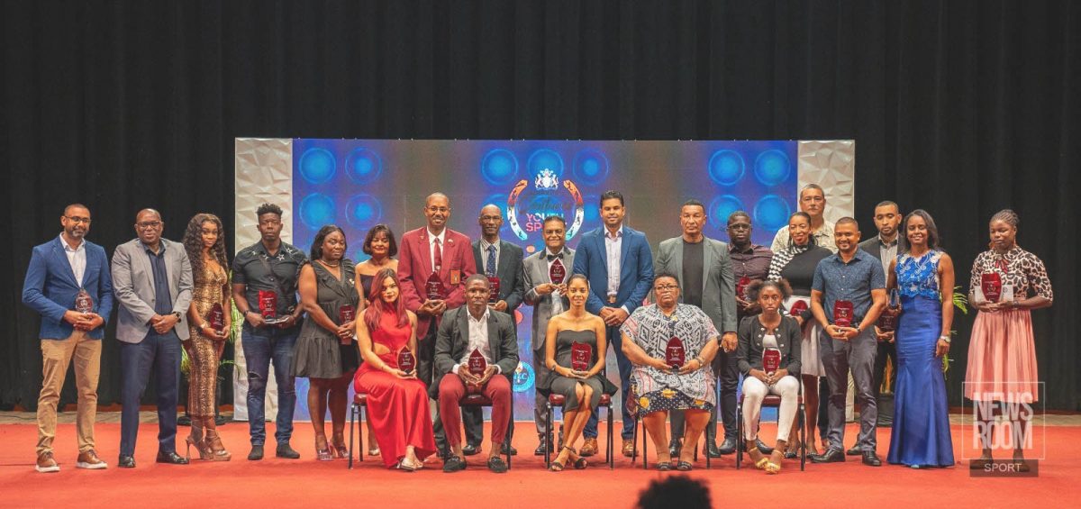 The winners and runners-up of Sunday night’s National Sports Awards ceremony at the National Cultural
Centre, along with Minister Charles Ramson Jnr., and the rest of the hard working officials. (Akeem Greene photo)