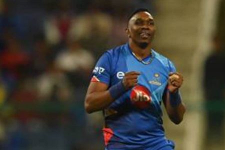 Veteran all-rounder Dwayne Bravo celebrates one of his two wickets in yesterday’s win. 