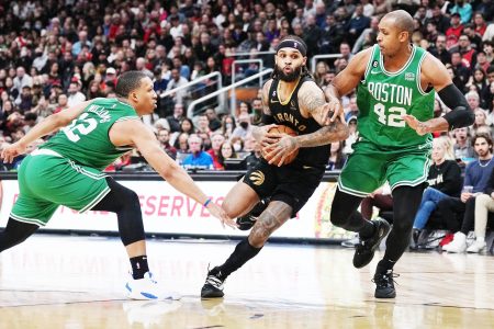 Toronto Raptors guard Gary Trent Jr. (33) drives to the basket as Boston Celtics center Al Horford (42) and forward Grant Williams (12) defend during the fourth quarter at Scotiabank Arena. Mandatory Credit: Nick Turchiaro-USA TODAY Sports

