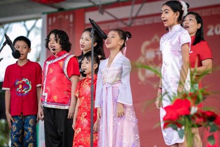 Prime Minister Mark Phillips and his wife, Mignon Bowen-Phillips, joined members of the Chinese community on Sunday to observe the 2023 Chinese Lunar New Year and Spring Festival. The event, which was organised by the Chinese Association of Guyana was held at the National Park in Georgetown. In this Office of the Prime Minister photo, children in traditional outfits in a musical rendition.