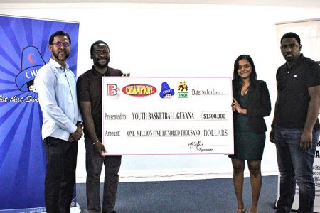 Beharry Brand Manager Malisa Jeffers presents the sponsorship cheque to YBG Co-Director Chris Bowman (2nd from left) in the presence of fellow Co-Director Rayad Boyce (left) and association official Tequain Vieira.