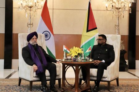 Hardeep Singh Puri, India’s Petroleum Minister (Left) with President Irfaan Ali.