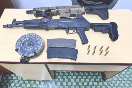 The weapons recovered and the ammunition (Police photo)