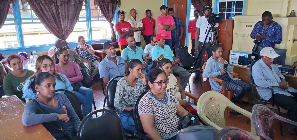 Leguan residents listening to Minister within the Ministry of Public Works, Deodat Indar (Ministry of Public Works photo)