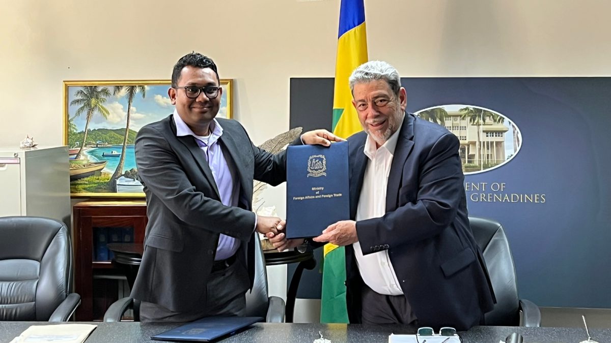 Dowlat Parbhu (left) of Demerara Bank and Prime Minister of Saint Vincent and the Grenadines, Dr  Ralph Gonsalves with the agreement. (Demerara Bank Limited photo)