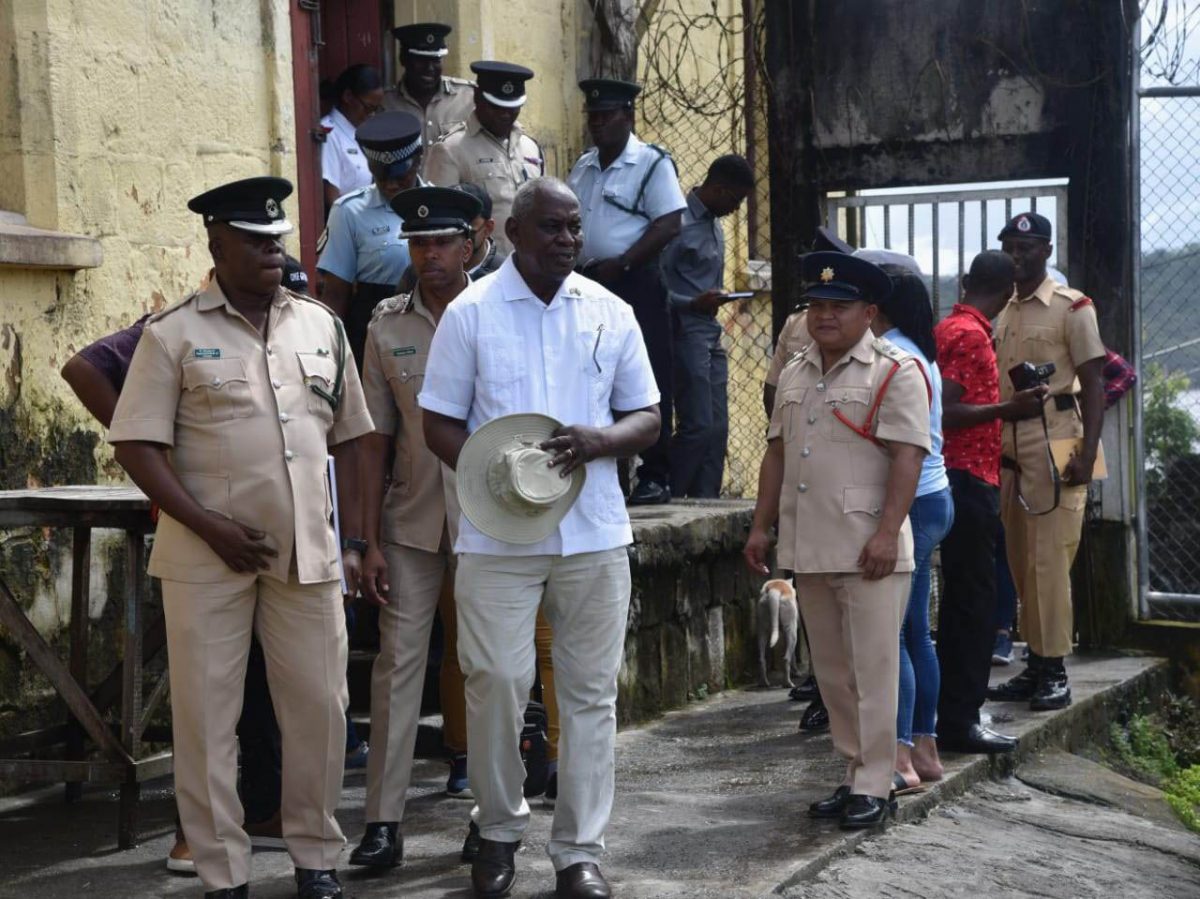 Minister of Home Affairs, Robeson Benn (centre) visited the Mazaruni prison on Friday. (GPS photo)
