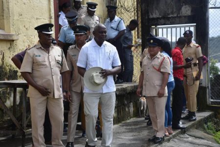 Minister of Home Affairs, Robeson Benn (centre) visited the Mazaruni prison on Friday. (GPS photo)
