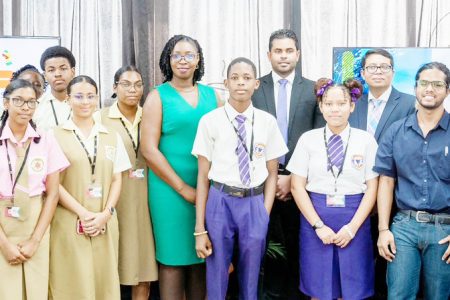 Minister of Culture, Youth and Sport,  Charles S. Ramson, MP; SBM Offshore’s General Manager, Martin Cheong, and Human Resource Manager, Onecia Johnson with the winners of the National Science Fair Competition. (SBM Offshore photo)