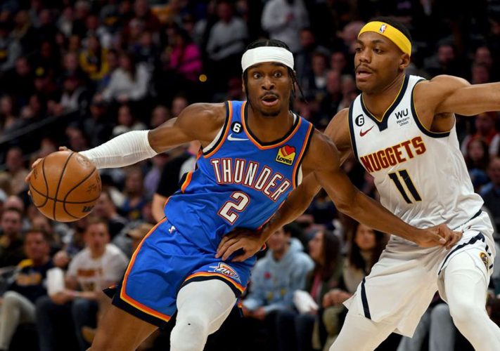 Oklahoma City Thunder guard Shai Gilgeous-Alexander (2) drives on Denver Nuggets forward Bruce Brown (11) during the first quarter at Ball Arena. Mandatory Credit: John Leyba-USA TODAY Sports