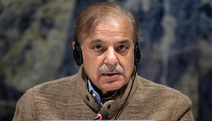 Prime Minister Shehbaz Sharif delivers a speech at the start of Pakistan´s Resilience to Climate Change conference in Geneva on January 9, 2023. — AFP