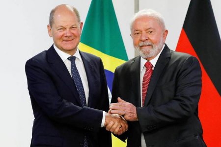 German Chancellor Olaf Scholz (left) is welcomed by Brazilian President Luiz Inacio Lula da Silva. PHOTO: AFP