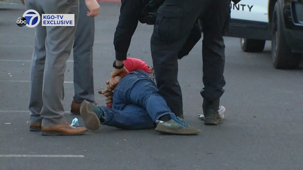 A suspect is arrested by law enforcement personnel after a mass shooting at two locations in the coastal northern California city of Half Moon Bay, California, U.S. January 23, 2023 in a still image from video. ABC Affiliate KGO via REUTERS. 