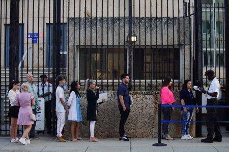 People wait in line to enter the U.S. embassy in Havana, Cuba, January 4, 2023. REUTERS/Alexandre Meneghini 