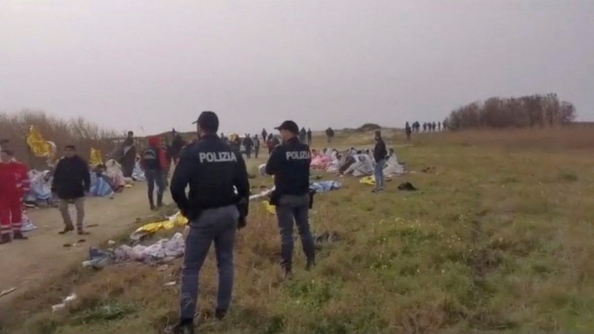 A screengrab taken from a video shows police officers standing at the beach where bodies of believed to be refugees were found after a shipwreck, in Cutro, the eastern coast of Italy's Calabria region, Italy, February 26, 2023. Italian Police/Handout via REUTERS  ATTENTION EDITORS - THIS PICTURE WAS PROVIDED BY A THIRD PARTY. MANDATORY CREDIT